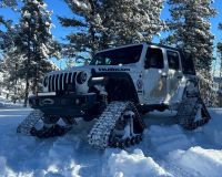Jeep Rubicon turned into Snow Machine Search and Rescue.jpg