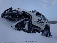 American-Track-Truck-Jeep-Liberty-in-Snow.jpg