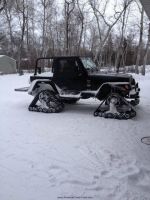 Jeep-Wrangler-on-Snowmobile-Tracks.jpg