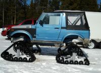 Suzuki-Sidekick-on-Snowmobile-Tracks.jpg